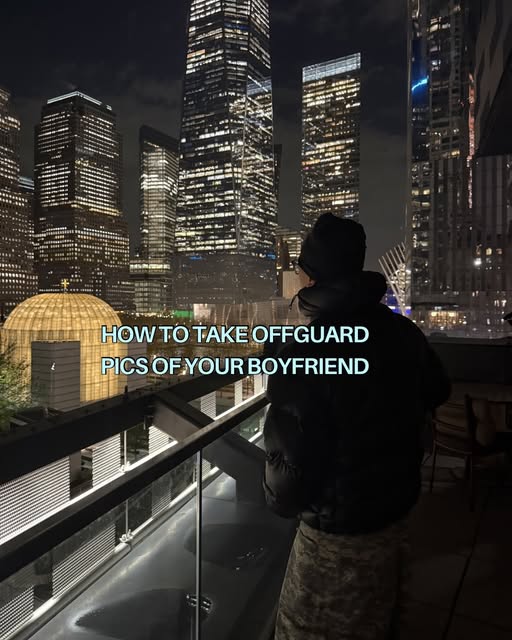 Rooftop at night over the Lower Manhattan skyline — “How to take offguard pics of your boyfriend”